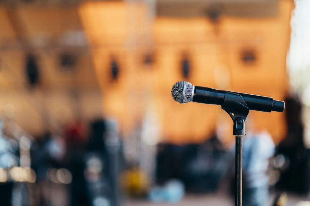 Microphone on a stage during a concert on a festival